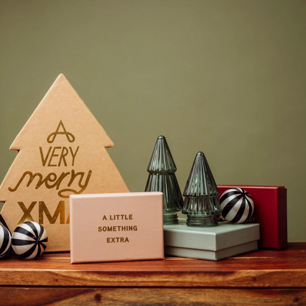 Christmas still life with gift boxes and decorative christmas ornaments